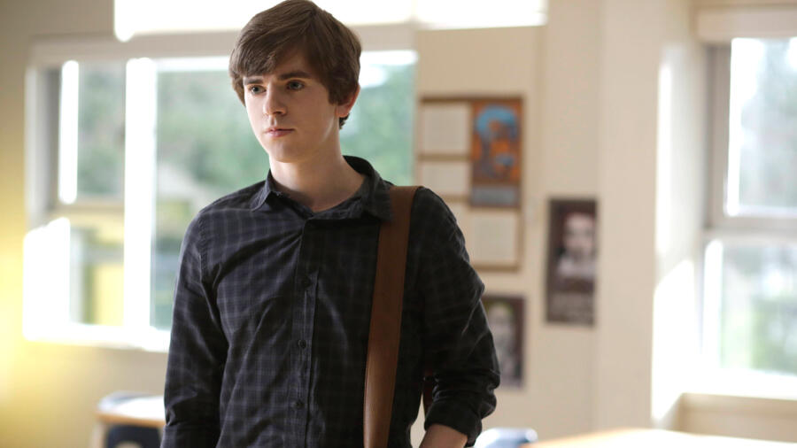 Norman watches Miss Watson leave