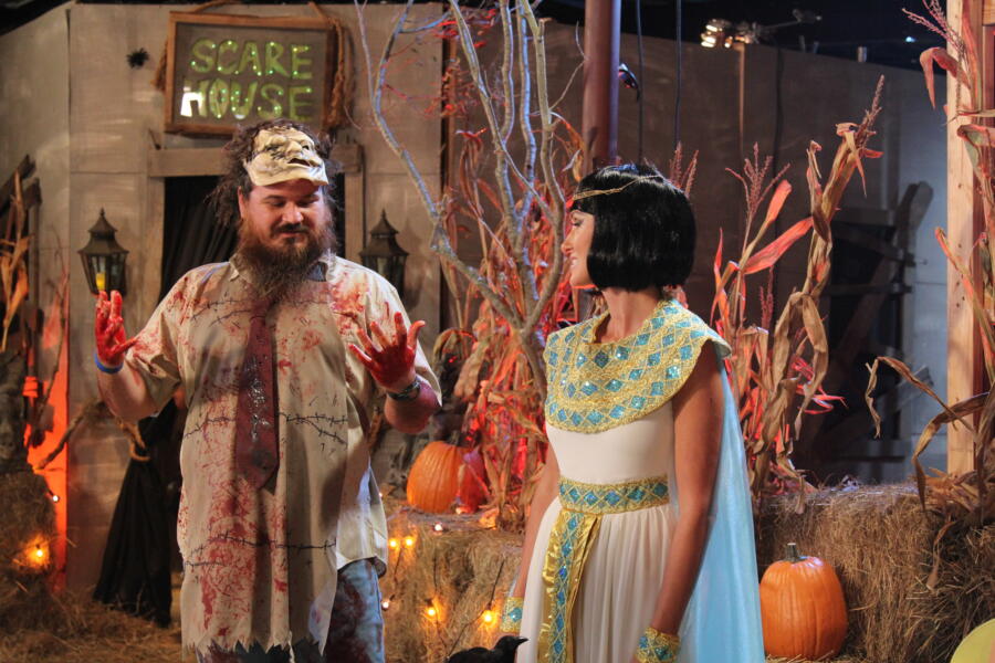 Blood-soaked Martin and Korie wait for the rest of the family to arrive in their costumes.