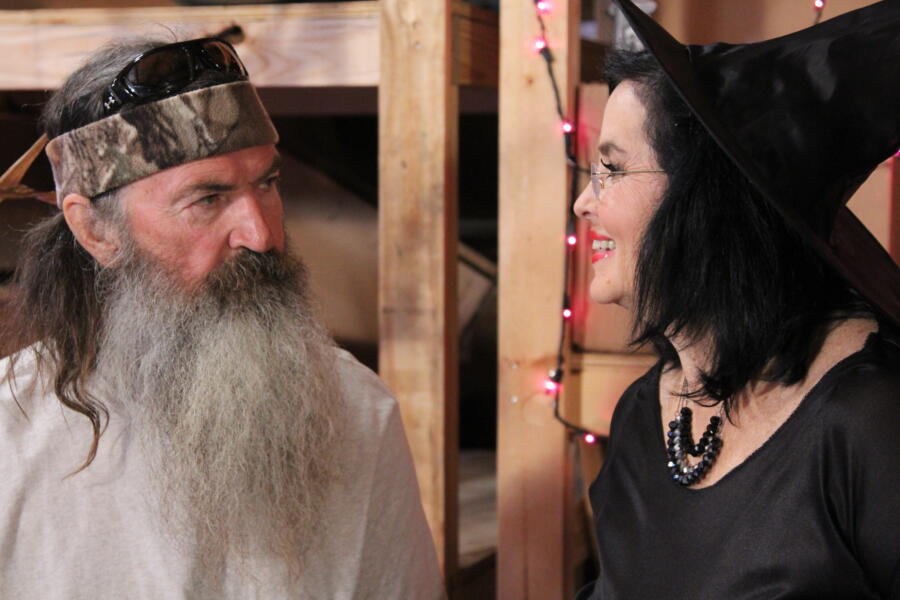 Phil doesn't like Halloween, but he eventually puts on a tie and says he's dressed as a yuppie politician.