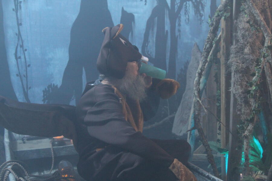 Si is dressed as a mutant beaver who eats children. But even mutant beavers need to relax with a cup of tea once in a while.