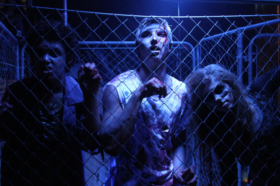 The Robertson teens stumble around as zombies.