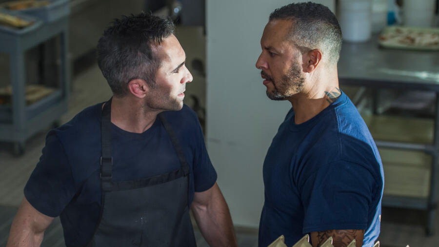 Another inmate gets in Romero’s face.