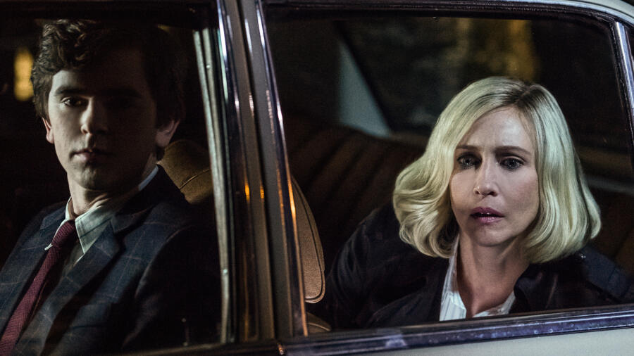 Norman and Norma watch as Madeleine and Sam drive away.