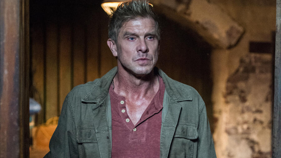 Caleb finds the massive freezer in the basement.