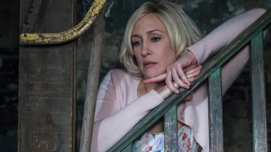 Caleb sees Norma on the stairs.