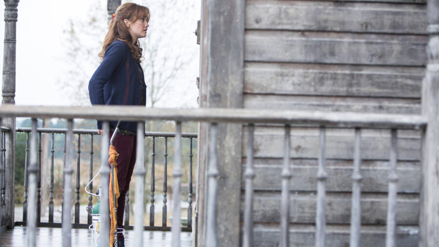 Emma approaches the house
