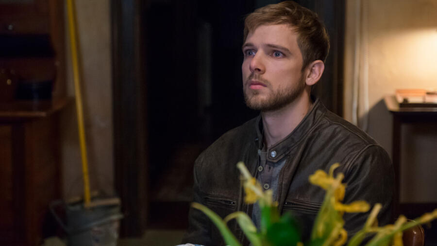 Dylan looks on, shocked.