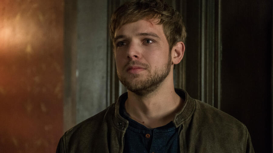 Dylan begs Norman to put down the knife.