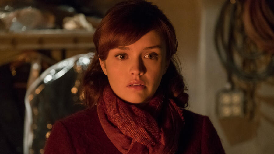 Emma watches the cremation