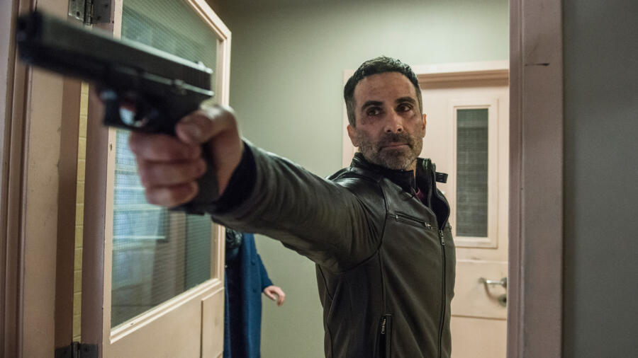 Romero (Nestor Carbonell) arrives at the station