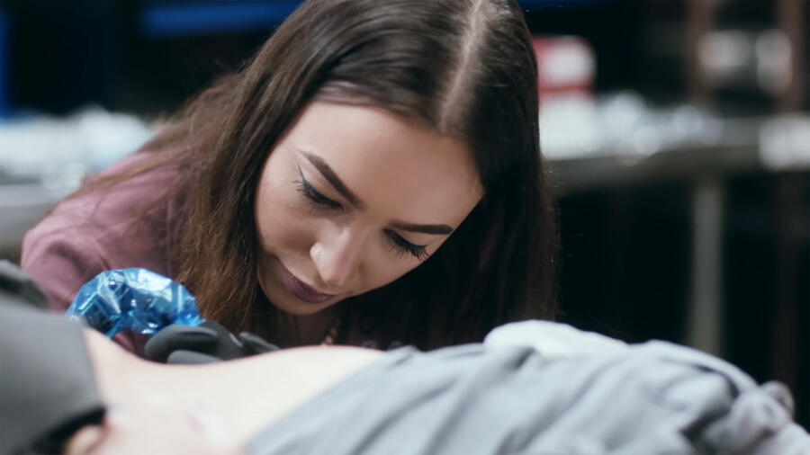 Janice listens as Holly recounts a story of being carjacked.