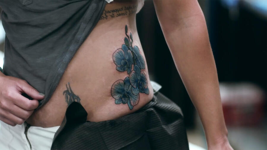 The blue of the orchids represent law enforcement.