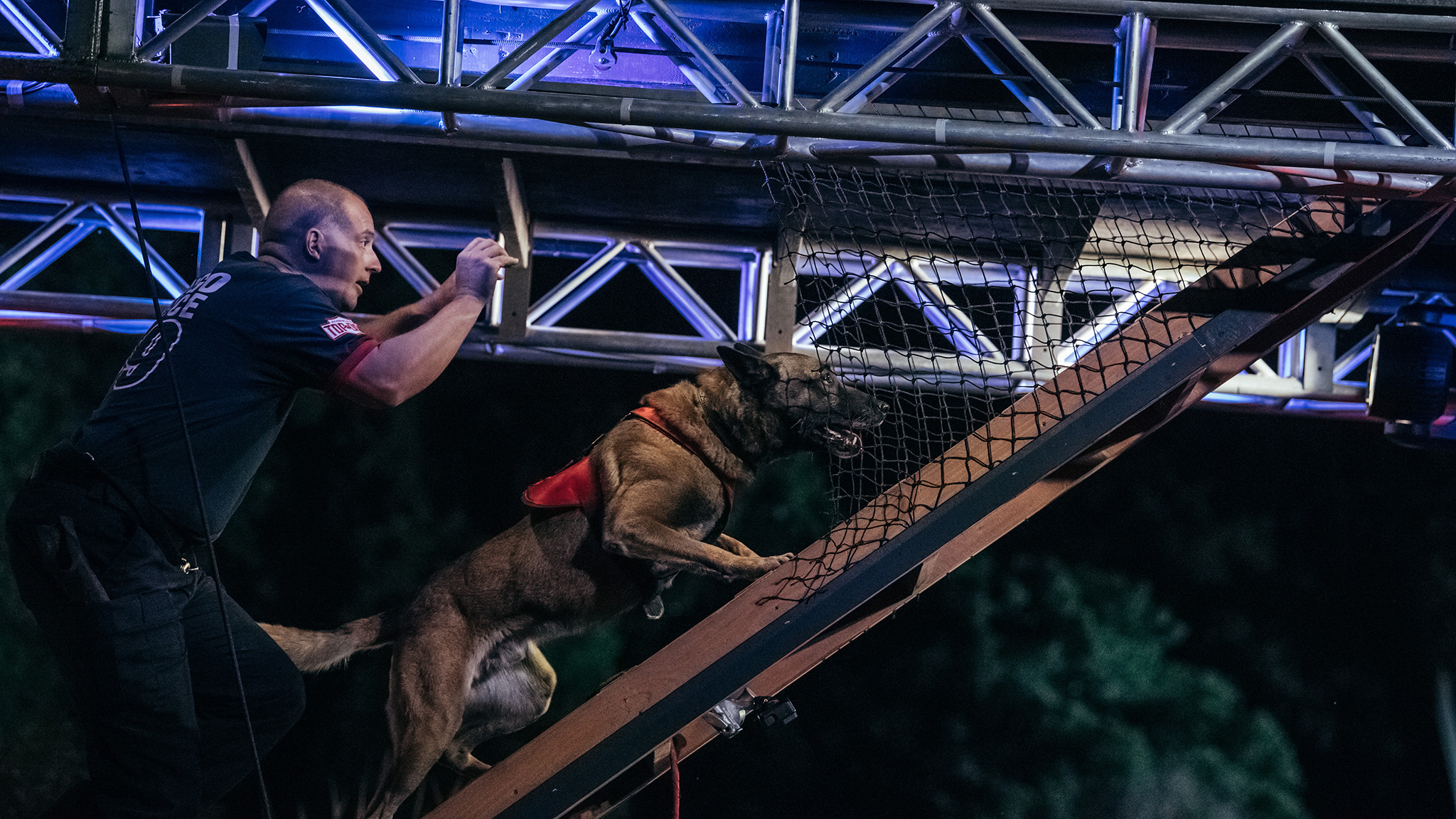 AA K9 team navigates the challenging Fire Escape.