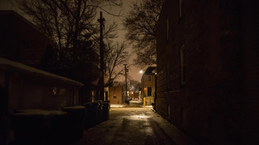 Dark and scary city alley at night