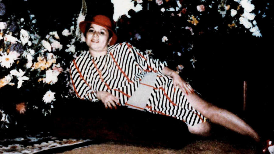Griselda Blanco lounging on a cushion