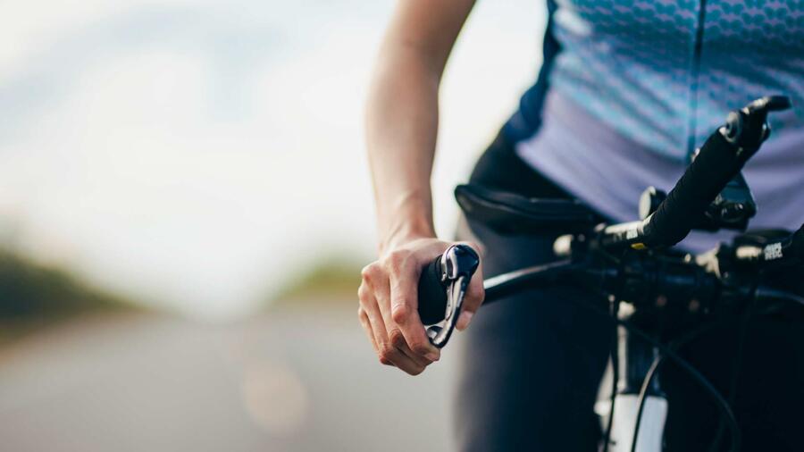 Conceptual photo of an unrecognizable female cyclist