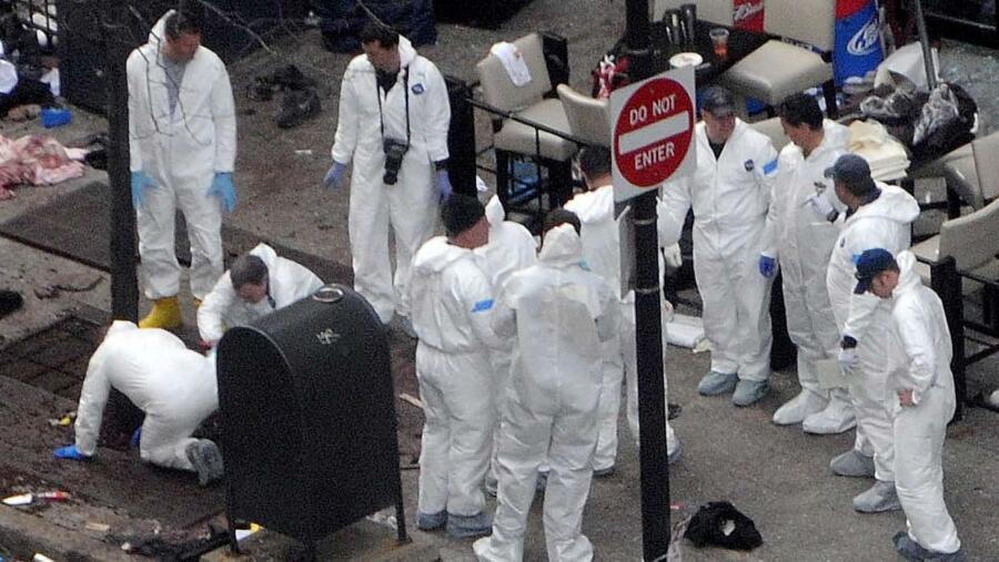 Investigators at the scene of the Boston Marathon Bombing in 2013