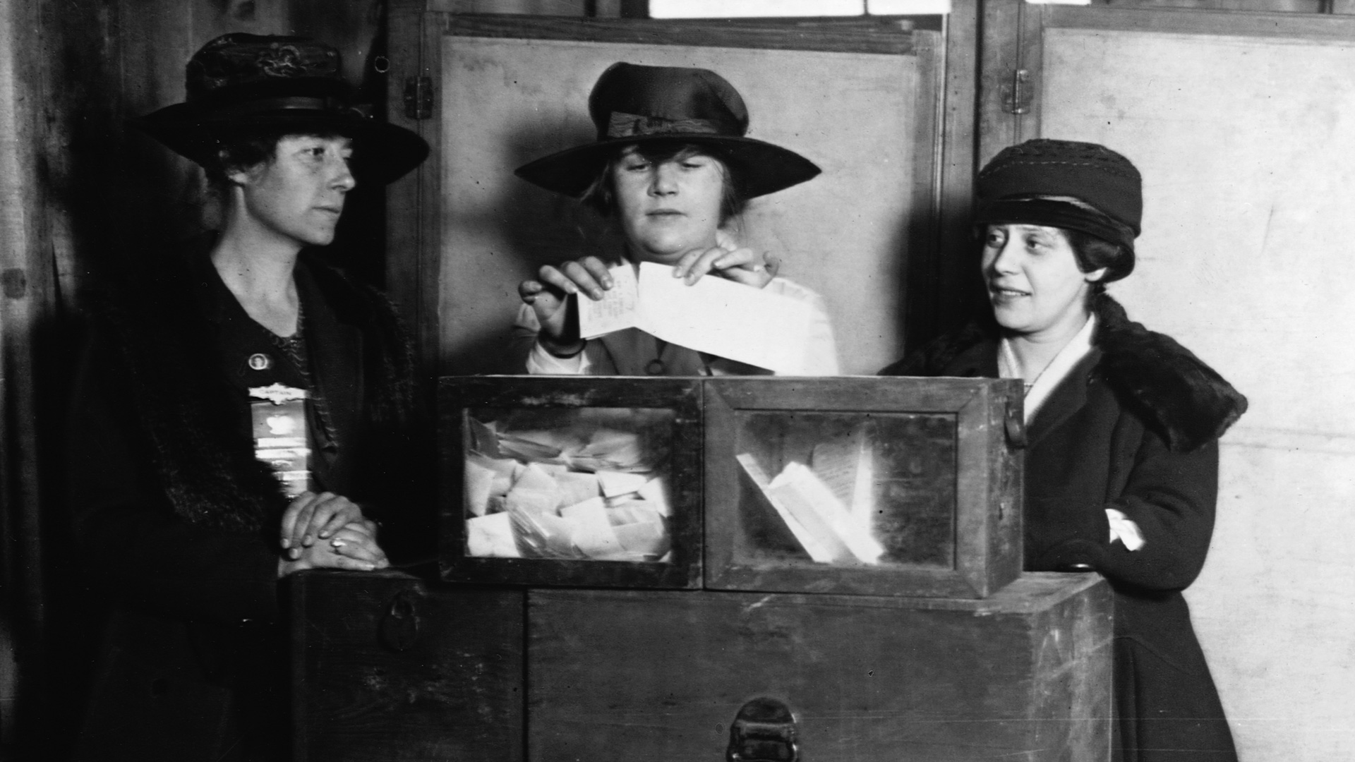 Three women vote at a polling station in New York City, New York, USA.