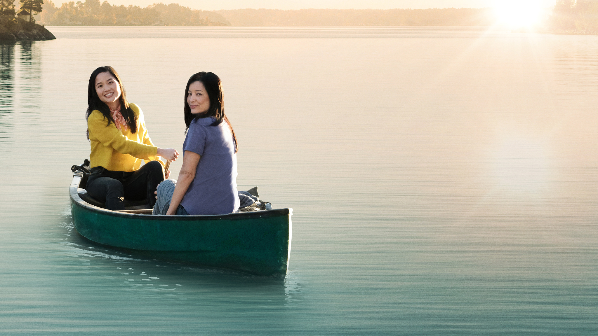 two women rowing in a boat