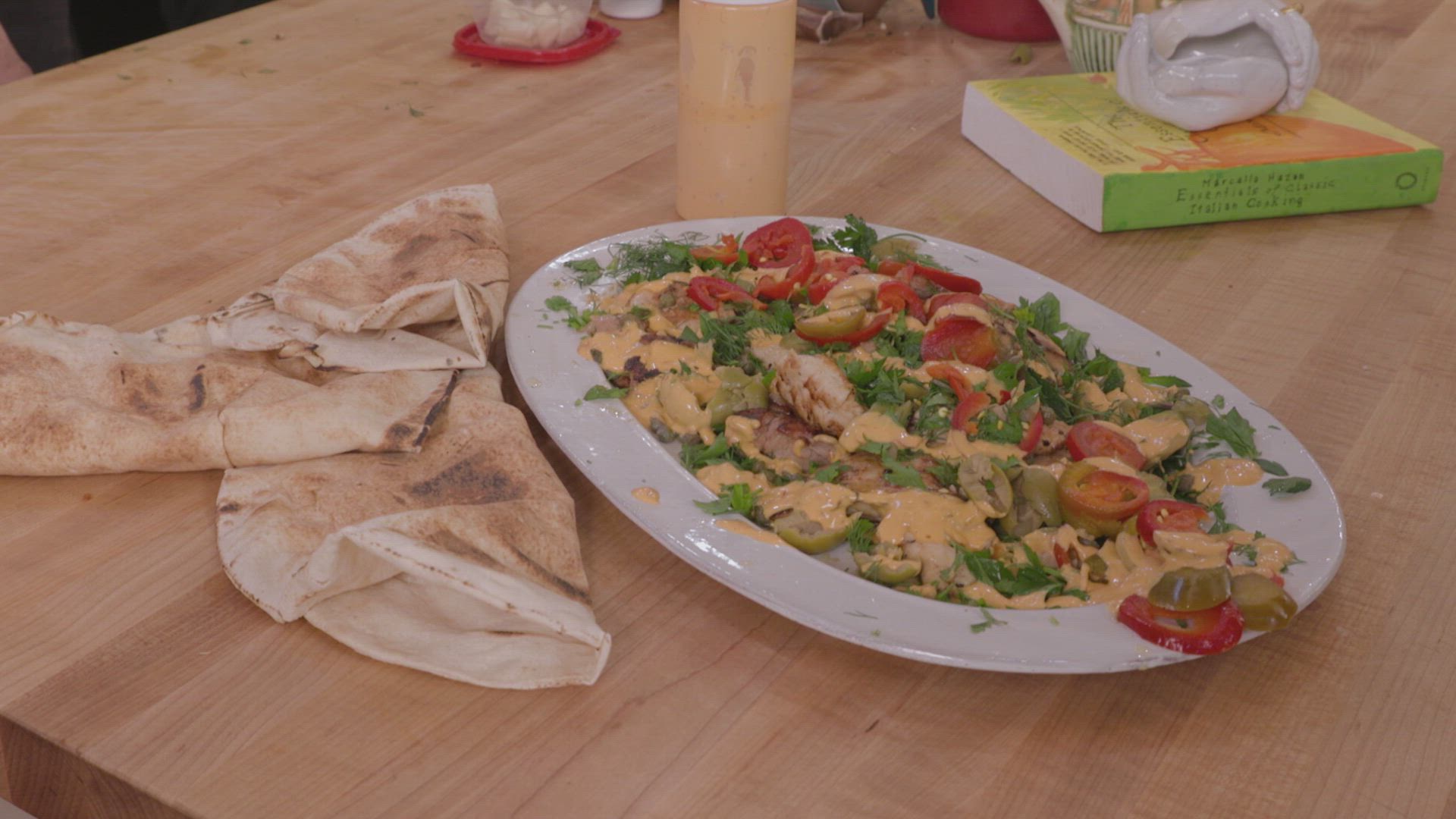 Charred Mediterranean Chicken Salad with Olives and Tahini Yogurt Sauce